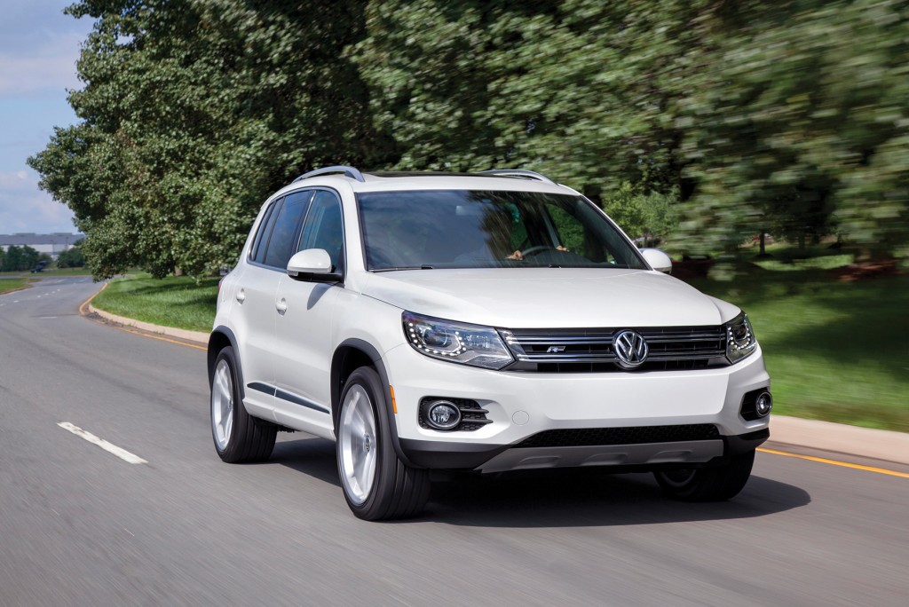 The Volkswagen Tiguan adds a sporty R-Line trim package for 2014. It has a firmer suspension and loaded cabin to go along with its sport-themed styling.