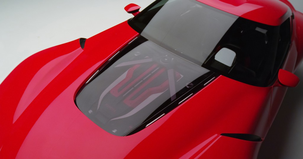 While Toyota did not name a specific engine envisioned for the FT-1, a transparent engine cover offers a peek at its performance potential with a classic front-engine, rear-wheel-drive layout.