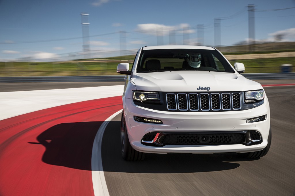 With black accents around the grille and unique LED headlights, the high-performance SRT version of Jeep’s Grand Cherokee has an aggressive look to match its track-tuned driving feel.