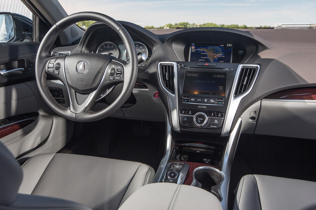 The TLX’s interior makes it easy to interact with technology using a touchscreen and big digital display on the center stack and an additional screen behind the steering wheel.